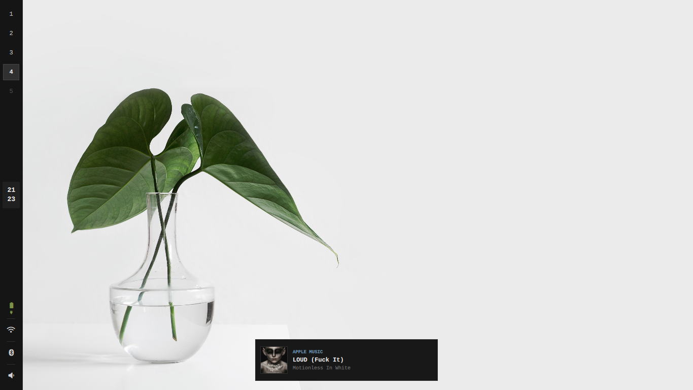 Desktop with the Quickshell side bar and media notification